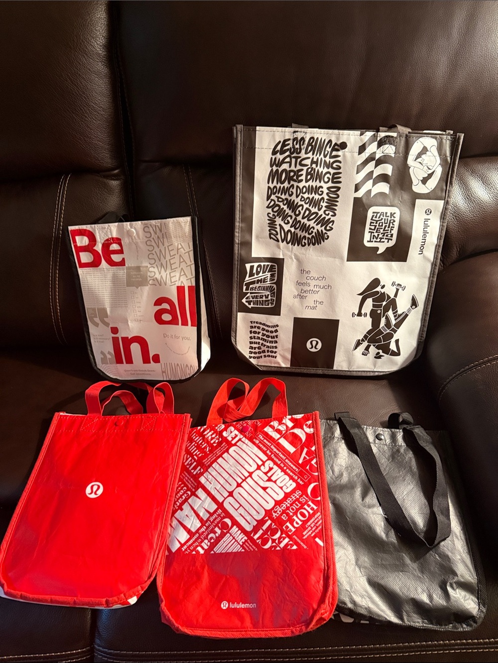 Bundle of 5 Lululemon bags.   1 large 4 small